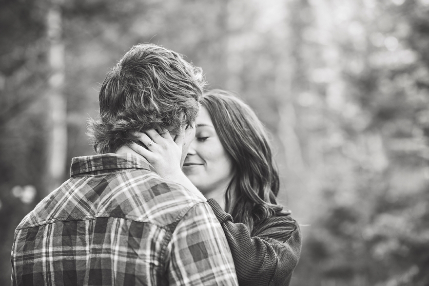 engagement photo in the woods